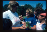 Camp Butwin staff and campers look at plants, Eagan, Minnesota