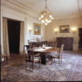 Glensheen Formal Dining Room facing serving buffets with dining room table