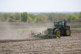 Spring discing of fields on the University of Minnesota, Rosemount Research and Outreach Center.