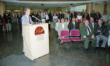 Speaker in lobby of Kathryn A. Martin Library during its dedication