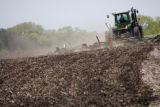 Spring discing of fields on the University of Minnesota, Rosemount Research and Outreach Center.