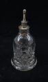 Glass and silver nursing bottle