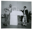 Robert J. Karon and Janet Karon posing by Lifeboat Station No. 5