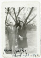 Henry, Richard, and Sally in front of a blossoming tree at the Jefferson Memorial