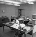 Person working at a table in the Computer Center in the Computer-Laboratory Building at UMD