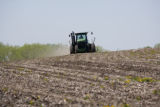 Spring discing of fields on the University of Minnesota, Rosemount Research and Outreach Center.