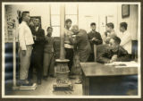 Nanking YMCA Physical Department: Dr. Gray, National Secretary for Physical Work, giving physical examinations to our staff. Pe