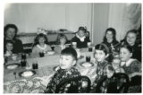 Bertha Edelstein Karon and Karon family children at a meal