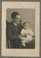 Portrait of Cavour Hartley holding his son John Hartley in his lap