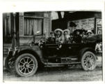 Ethel Mendelsonn and Bertha Bacrach sit together in a car with a group of other women on Canada Street