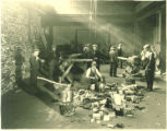 Men cutting wood as a form of "work relief" during the Great Depression