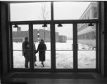 People entering the doors near the Tweed Gallery in winter