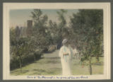 Mrs. d'Autremont walking in the yard of her cottage on London Road