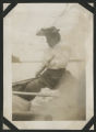 Carrie Eliza Hartley rowing a canoe on Cass Lake
