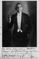 Inscribed postcard of an unidentified man in evening dress