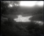 Brook Lodge, flood picture, showing water in ravine back of building