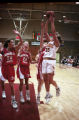 Action shot of UMD 1997 women's basketball player #35 jumping to catch ball