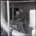 Person working with wood in the Industrial Education Building