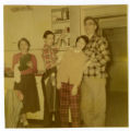 Kim Shapira, Suzon Karon, Janet Karon, and Robert J. Karon in a kitchen