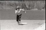 Action shot of UMD 1985 women's softball player running to base