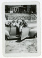 Suzon, Robert, and Janet Karon in a convertible car