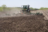 Spring discing of fields on the University of Minnesota, Rosemount Research and Outreach Center.