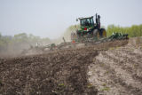 Spring discing of fields on the University of Minnesota, Rosemount Research and Outreach Center.