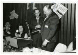 E. David Krawetz and Leonard Rapoport shake hands during the Jewish Community Center's annual dinner and meeting, St. Paul, Minnesota