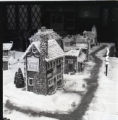 Hotel in gingerbread village inside Glensheen's Carriage House garage