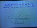Biomolecular solvation: from molecular to continuum models