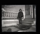 Tom Roberts standing on a porch