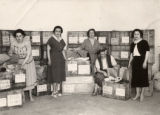 Greek women and aid supplies