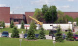 Robert W. Bridges Fleet Grounds Maintenance Building with work trailers and cranes