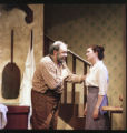 Two actors performing on stage in the 1994 UMD production of "The Baker's Wife"