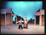 Two actors performing on stage in the 1987 UMD production of "Fiddler on the Roof"