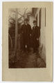 Kenneth D. Miller and Mr. Sedy standing in front of a rural house in northern Moravia