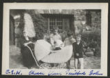 Carrie Eliza Hartley sitting beside Chester Adgate II, Clara, G.G.H., and John Congdon on a patio at Congdon Castle