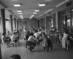 Students sitting at tables in the UMD cafeteria
