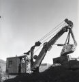 Crane removing dirt from the foundation of the Education and Psychology Building