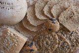 Milling wheat at a small bakery in Maplewood,Minnesota, where breads, muffins, rolls and cookies are baked using Whole grains.