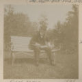 Ralph Nevers sitting on a bench