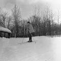 A person skiing at the top of Rock Hill