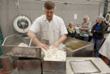 Making cheddar cheese in the Pilot Plant in the Food Science and Nutrition Building, St. Paul campus, University of MInnesota.