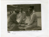 Hospital #27, September 1918, Y girl playing checkers with a wounded soldier.