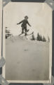 Child skiing down a hill in Woodland