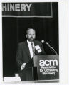Man Giving Presentation at ACM Annual Meeting (Box 4, Folder 7)