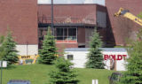 Robert W. Bridges Fleet Grounds Maintenance Building with work trailers and cranes