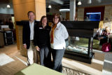 Three faculty members standing in Kirby Student Center