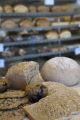 Milling wheat at a small bakery in Maplewood,Minnesota, where breads, muffins, rolls and cookies are baked using Whole grains.