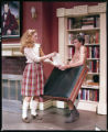 Two actors performing on stage in the 1984 UMD production of "Romantic Comedy"